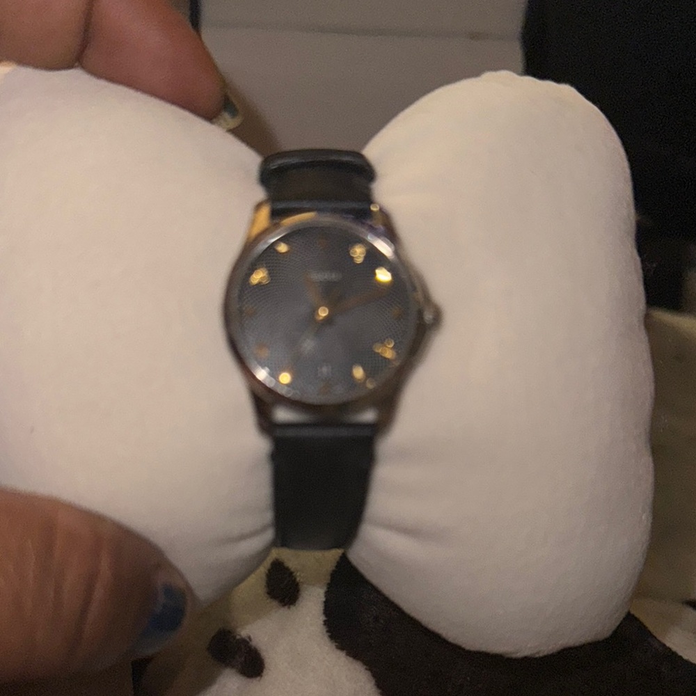 Gucci Black and Gold Watch